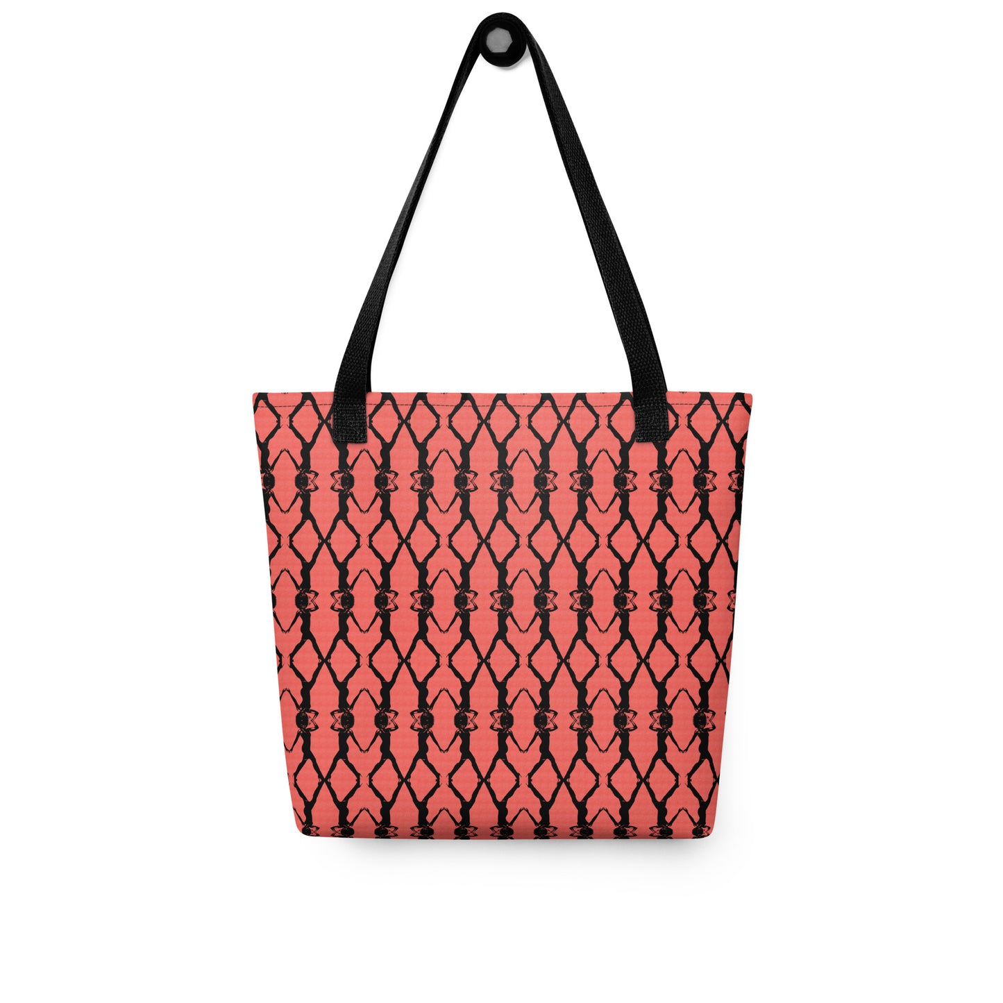Tote bag with red and black geometric pattern on a white background