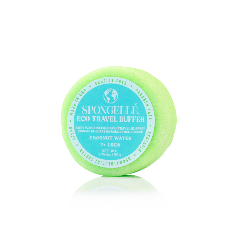 Spongellé Eco Travel Buffer with coconut water on a white background