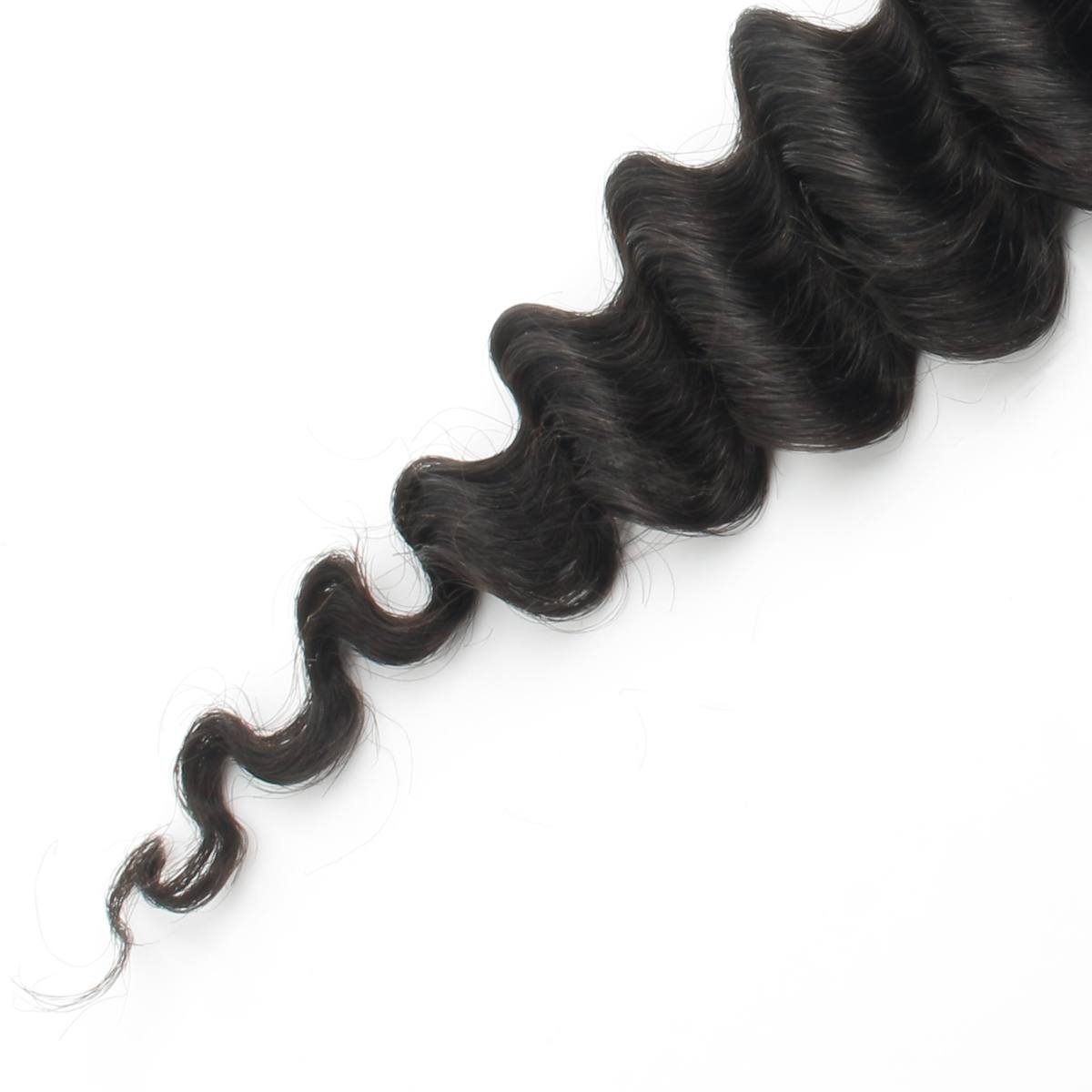 Black hair extensions with loose curls on a white background