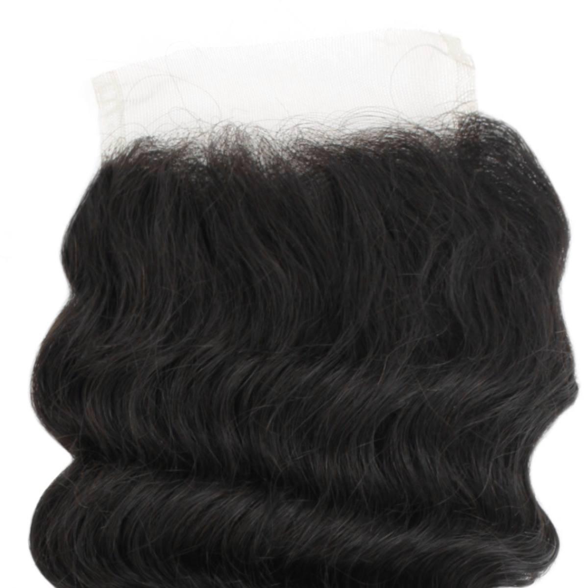 Black wavy hair bundle with a white lace closure on a white background
