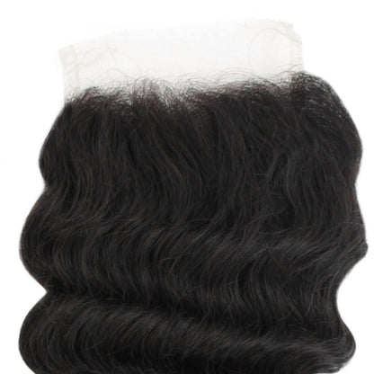 Black wavy hair bundle with a white lace closure on a white background