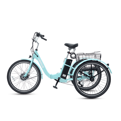 Light blue tricycle with basket on a black background