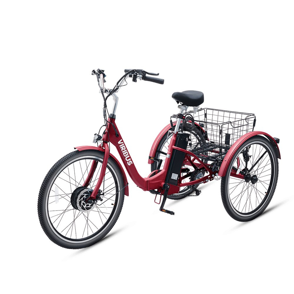 Red tricycle with a basket on a black background