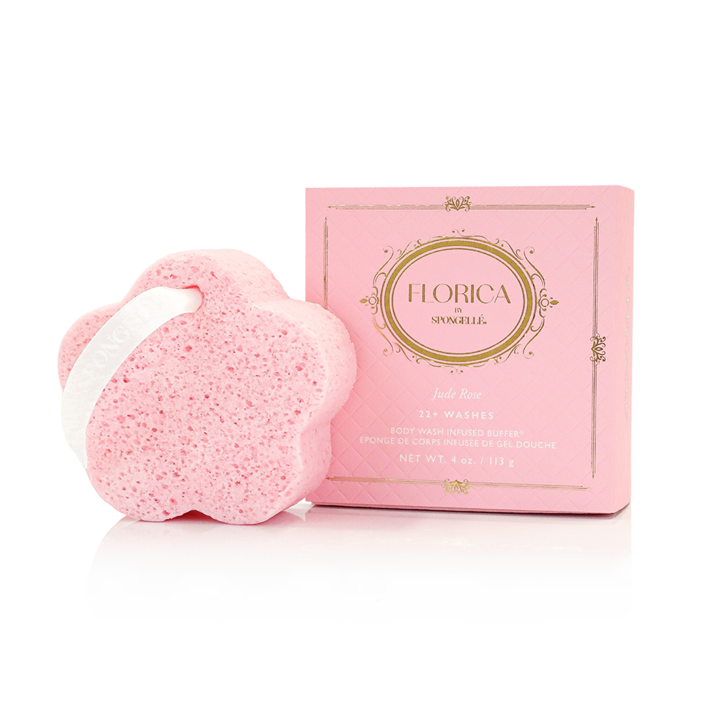 Pink bath bomb with white band and pink packaging labeled 'Florica' on a white background