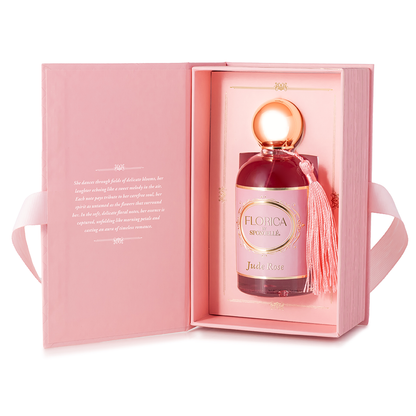 Florica perfume bottle in a pink box with a tassel on a white background