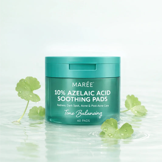 Jar of Maré 10% Azelaic Acid Soothing Pads with clover leaves on a light background
