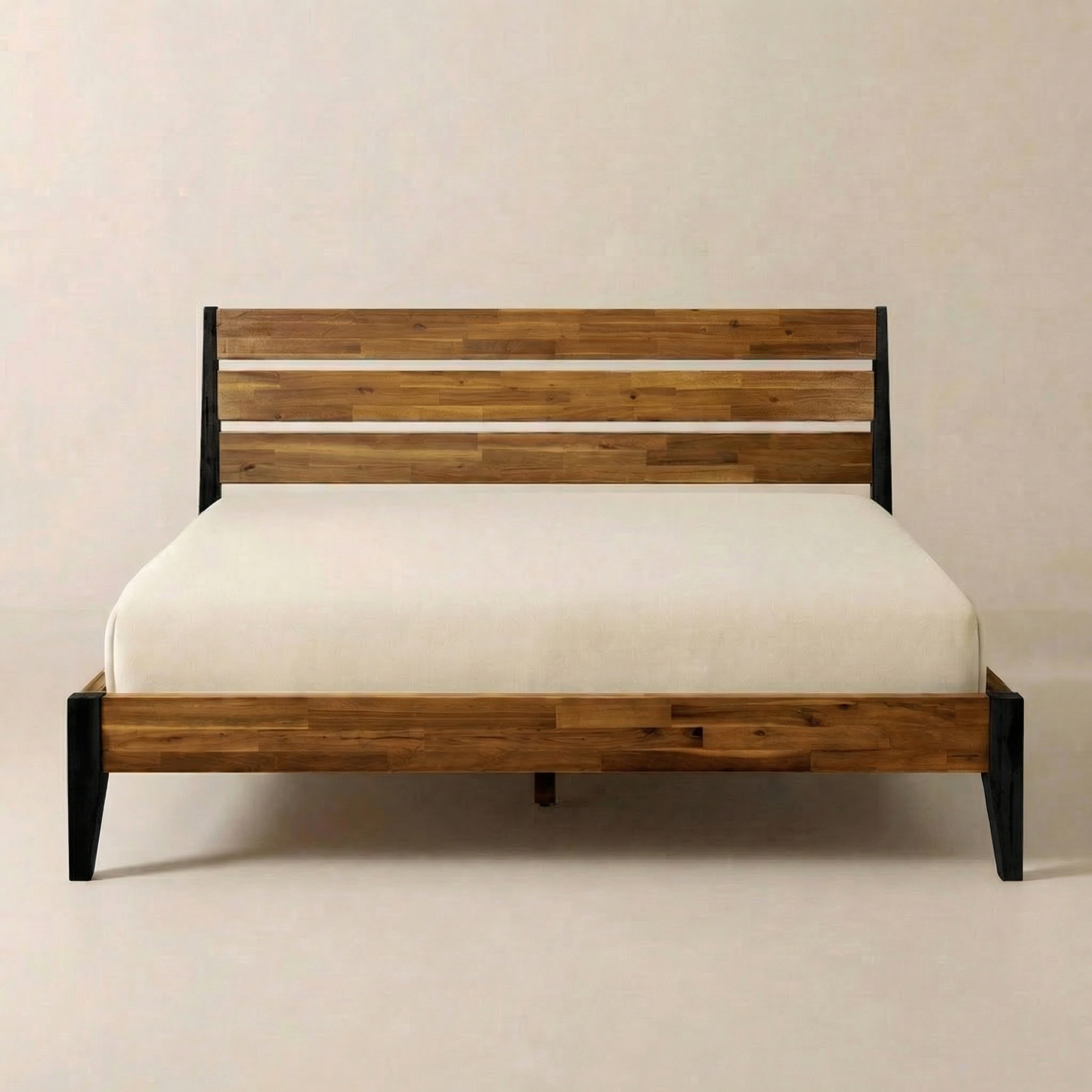 Wooden bed frame with white mattress on a beige background