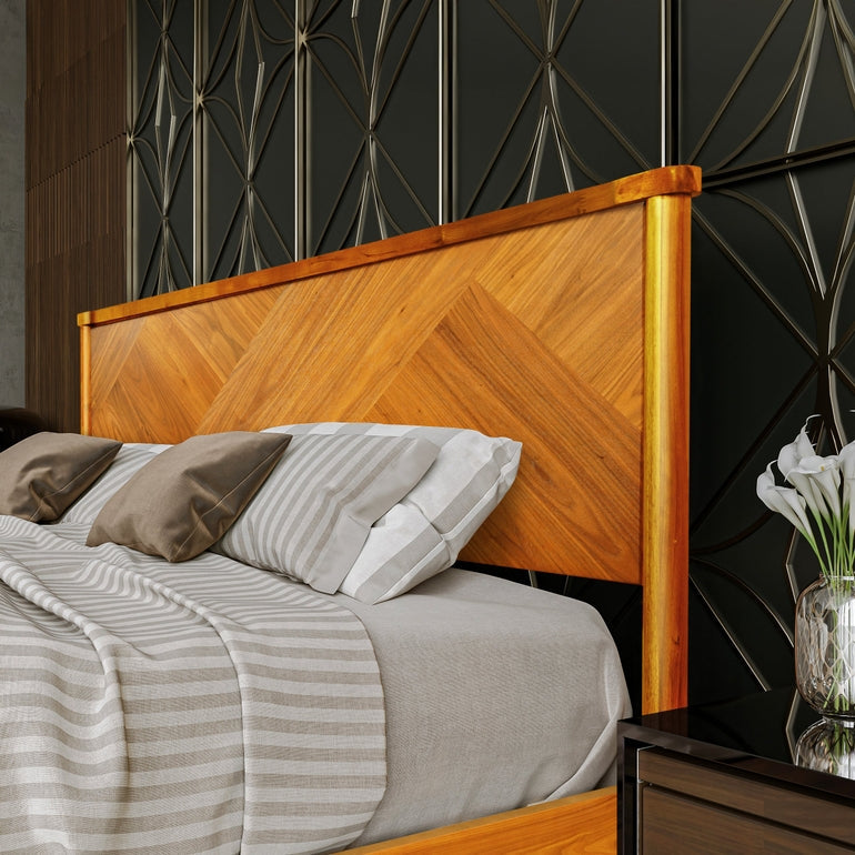 Bed with wooden headboard and geometric wall design