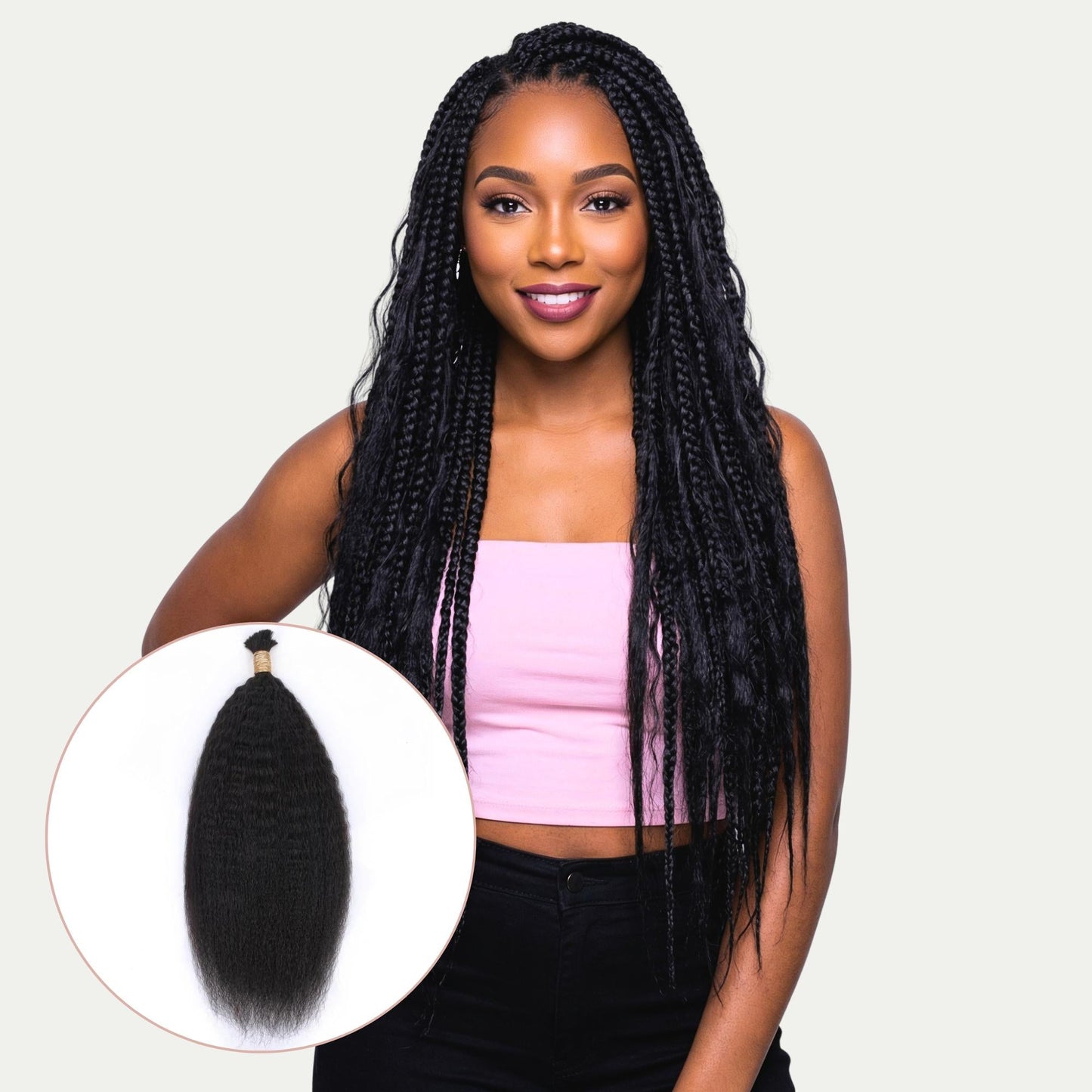 Woman with long braided hair holding a hair extension against a plain background