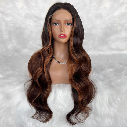 Mannequin head with a brown and blonde ombre wig on a white background