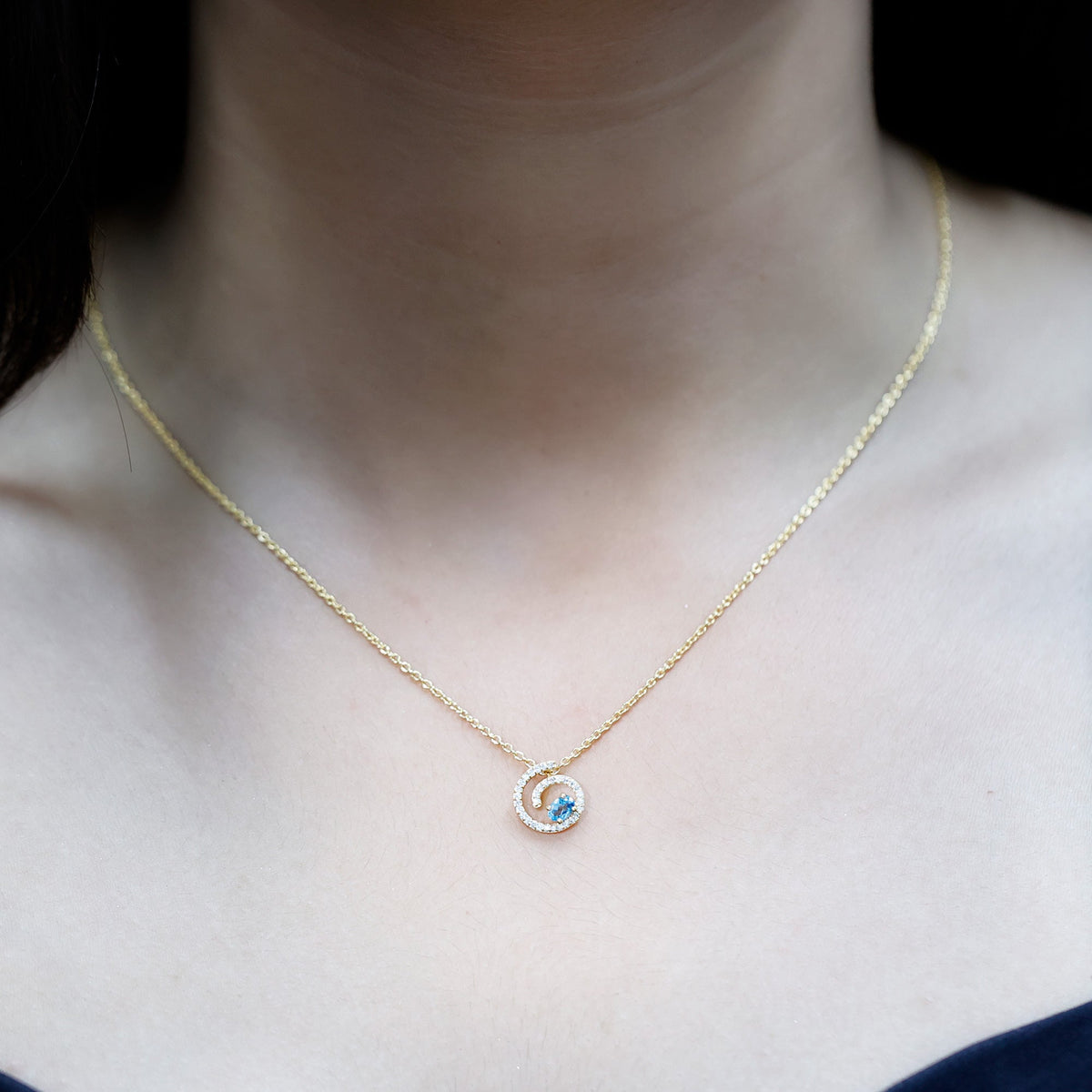 Genuine Sky Blue Topaz and Diamond Swirl Necklace with Silver Chain