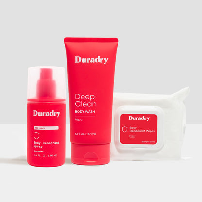 Duradry skincare products including spray, body wash, and wipes on a light gray background
