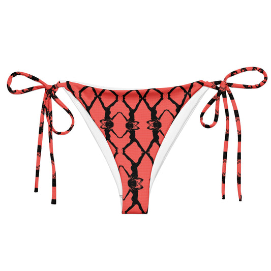 Red bikini bottom with black geometric patterns on a white background