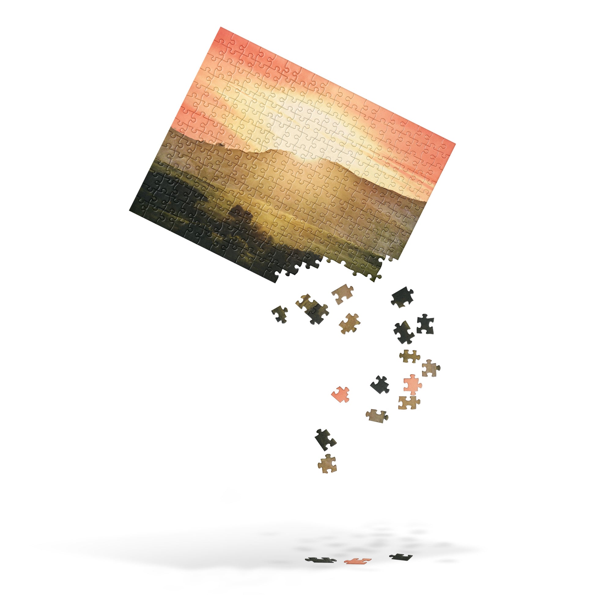 Jigsaw puzzle with image of the sun behind a mountain at golden hour