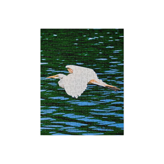 Your Suggested brand Jigsaw puzzle with a heron design on a white background