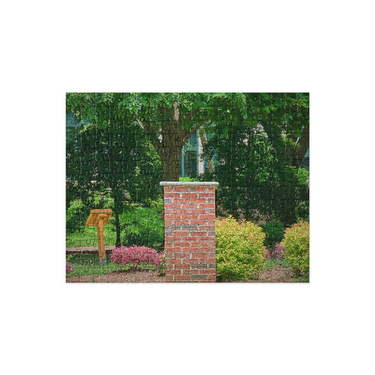 Your Suggested brand jigsaw puzzle illustrated with Brick column in a garden with trees and shrubs