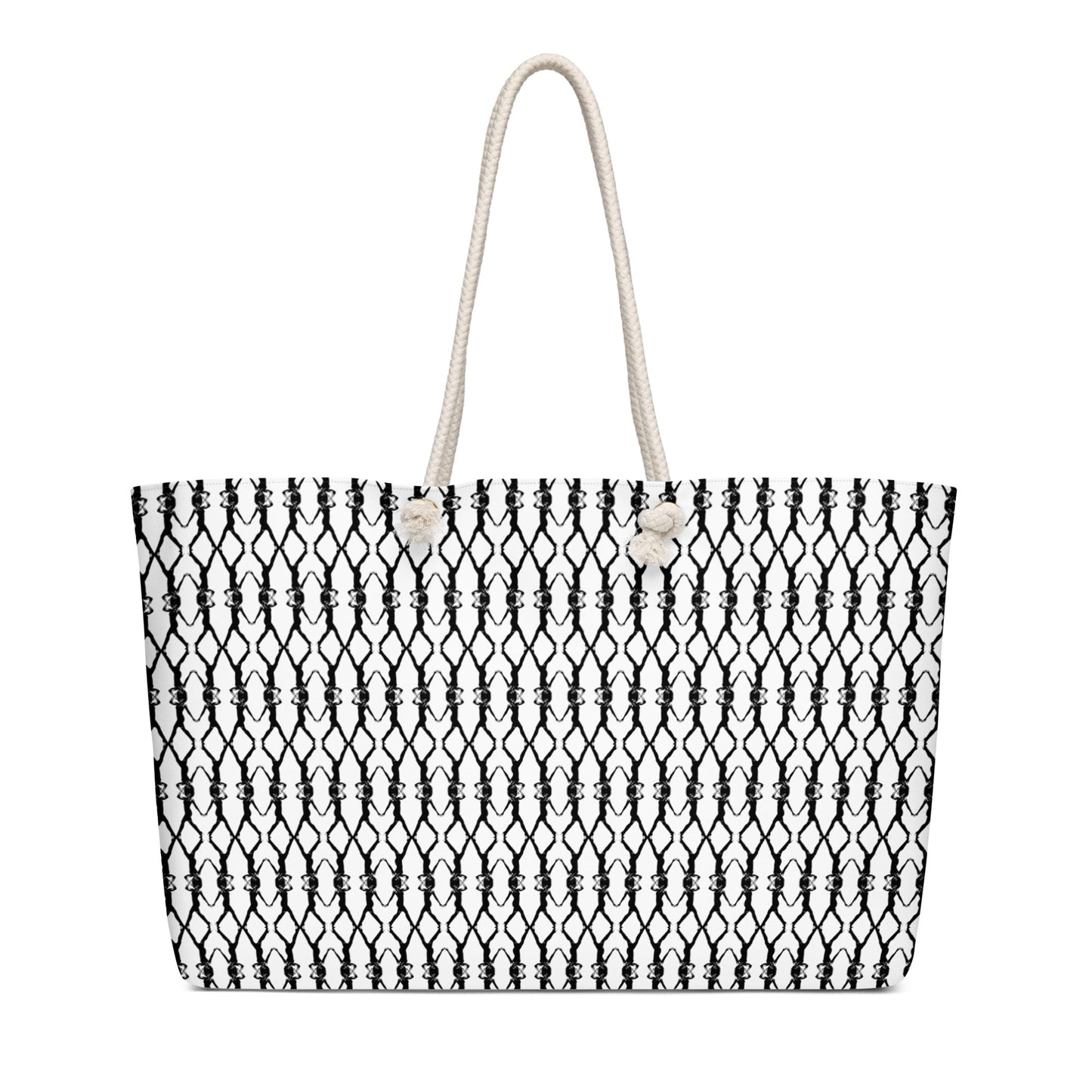 Black and white patterned tote bag with a rope handle on a white background