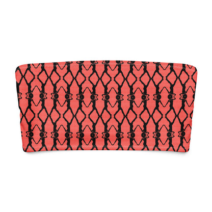 Red strapless top with black geometric pattern on a white background
