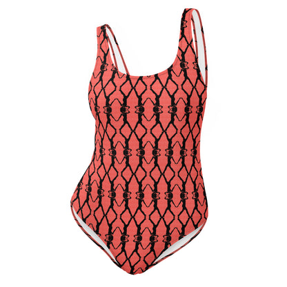 Red swimsuit with black geometric pattern on a white background
