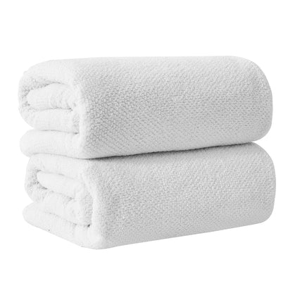Two folded white towels on a white background