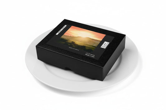 Your Suggested jigsaw puzzle box on a white dinner plate. Serving size 1 puzzle. 