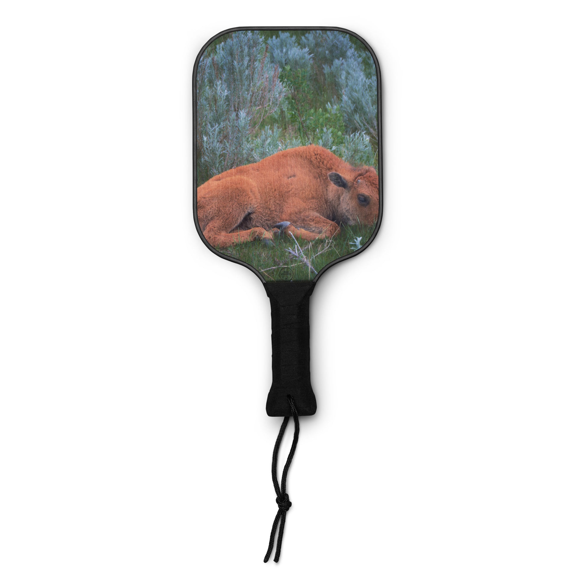 Your Suggested Brand Paddle with a design of a bison lying in a forest on a white background