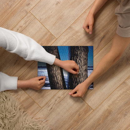 Two people working on a Your Suggested Brand jigsaw puzzle on a wooden floor